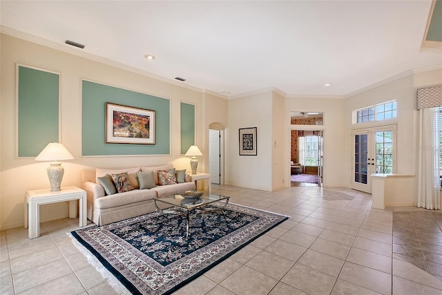 766 Shadow Bay Way, Osprey, FL 34229 - living area with arched walkways, light tile patterned floors, ornamental molding, and recessed lighting