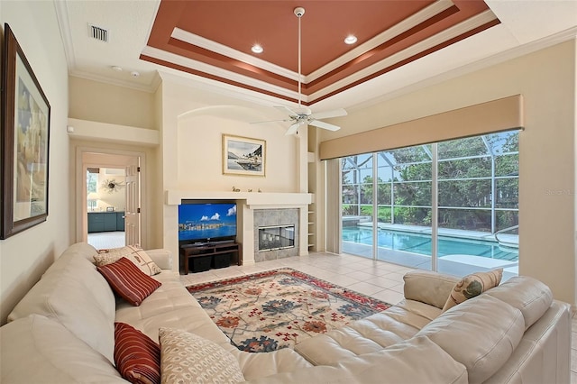 766 Shadow Bay Way, Osprey, FL 34229 - living area with ornamental molding, a ceiling fan, a raised ceiling, built in features, and recessed lighting