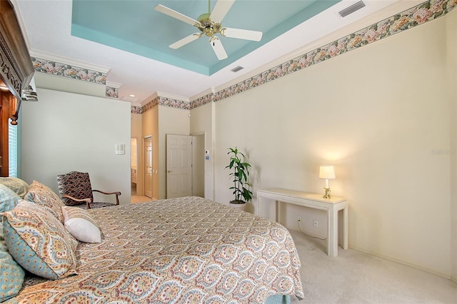 766 Shadow Bay Way, Osprey, FL 34229 - bedroom featuring a tray ceiling, carpet flooring, and a ceiling fan