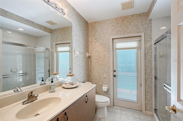 766 Shadow Bay Way, Osprey, FL 34229 - bathroom with tile patterned floors, vanity, and a shower stall