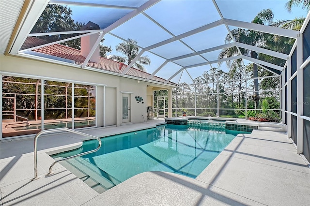 766 Shadow Bay Way, Osprey, FL 34229 - view of swimming pool featuring a patio, a pool with connected hot tub, and a lanai