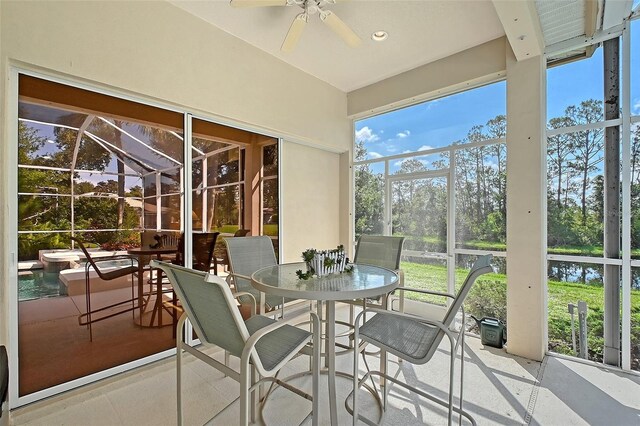 766 Shadow Bay Way, Osprey, FL 34229 - sunroom / solarium featuring a ceiling fan, outdoor dining space, and healthy amount of natural light