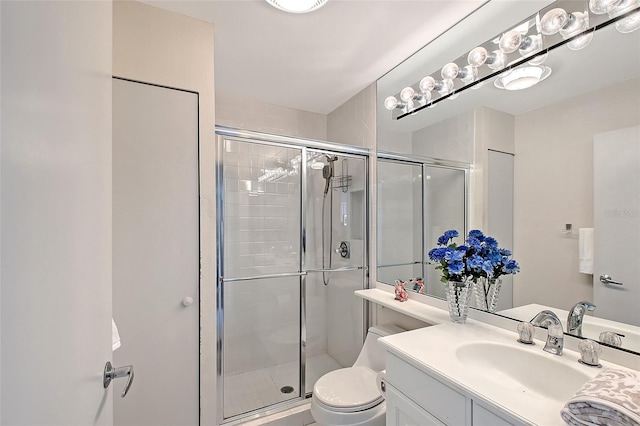 3070 Grand Bay Blvd Unit 644, Longboat Key, FL 34228 - bathroom with toilet, vanity, and a shower stall