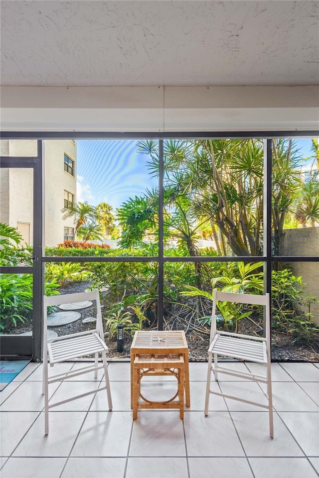 1001 Benjamin Franklin Dr Unit 106, Sarasota, FL 34236 - sunroom / solarium featuring healthy amount of natural light