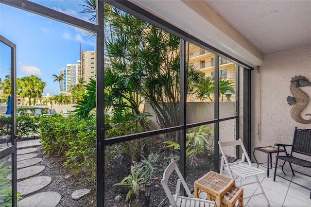 1001 Benjamin Franklin Dr Unit 106, Sarasota, FL 34236 - sunroom with plenty of natural light