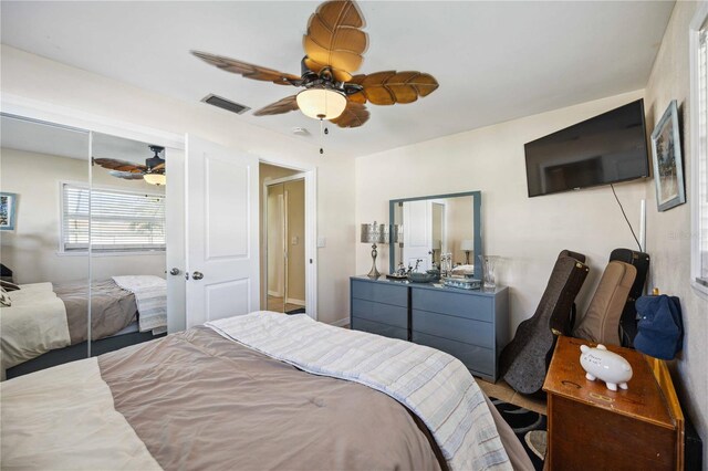 5808 SW 1st Pl, Cape Coral, FL 33914 - bedroom featuring a ceiling fan and a closet