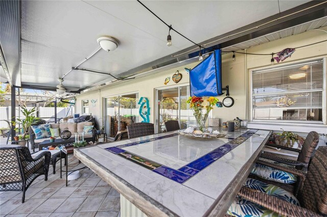 5808 SW 1st Pl, Cape Coral, FL 33914 - view of patio with an outdoor living space, outdoor dining space, fence, and a ceiling fan