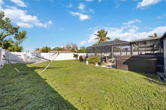 5808 SW 1st Pl, Cape Coral, FL 33914 - view of yard with a hot tub