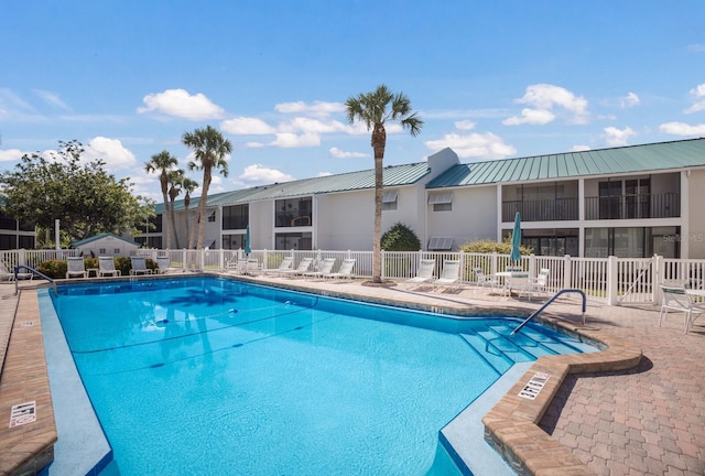 5623 Midnight Pass Rd Unit 615, Sarasota, FL 34242 - community pool with fence and a patio area