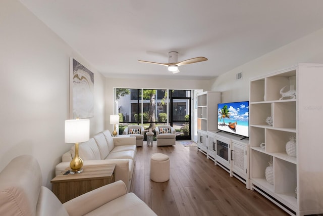5623 Midnight Pass Rd Unit 615, Sarasota, FL 34242 - living room featuring wood finished floors and a ceiling fan