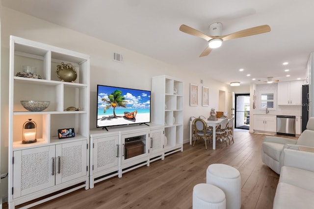5623 Midnight Pass Rd Unit 615, Sarasota, FL 34242 - living area with wood finished floors, a ceiling fan, and recessed lighting