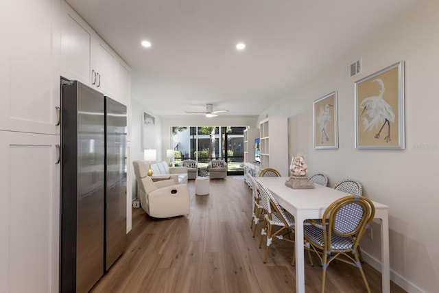 5623 Midnight Pass Rd Unit 615, Sarasota, FL 34242 - dining room with light wood-style flooring, recessed lighting, and ceiling fan