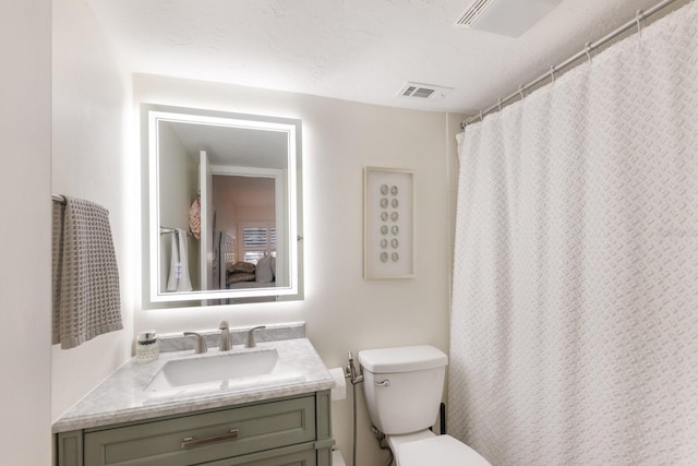 5623 Midnight Pass Rd Unit 615, Sarasota, FL 34242 - bathroom with vanity and toilet