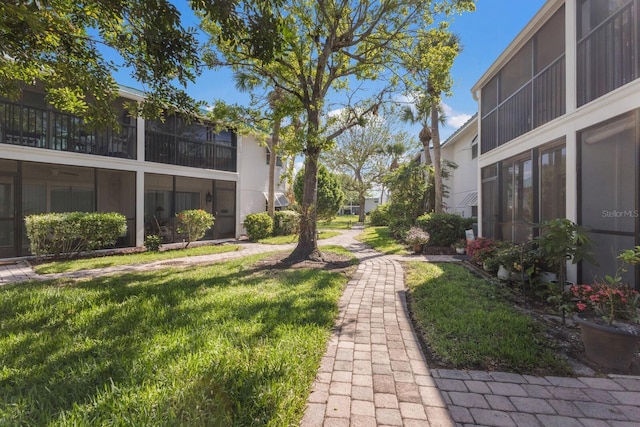 5623 Midnight Pass Rd Unit 615, Sarasota, FL 34242 - view of property's community with a yard