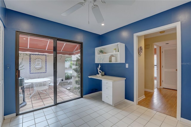 5039 Kestral Park Dr Unit 67, Sarasota, FL 34231 - unfurnished office with ceiling fan, baseboards, and light tile patterned floors