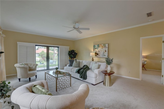 5039 Kestral Park Dr Unit 67, Sarasota, FL 34231 - living room featuring a ceiling fan, carpet flooring, baseboards, ornamental molding, and french doors