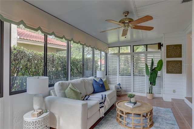 5039 Kestral Park Dr Unit 67, Sarasota, FL 34231 - sunroom / solarium with a ceiling fan and an outdoor hangout area