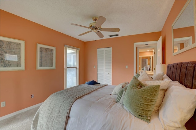 5039 Kestral Park Dr Unit 67, Sarasota, FL 34231 - bedroom with carpet, a closet, baseboards, ceiling fan, and a textured ceiling