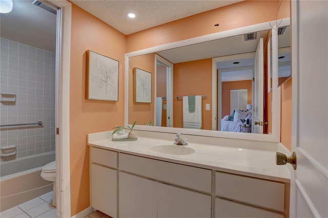 5039 Kestral Park Dr Unit 67, Sarasota, FL 34231 - bathroom featuring vanity, tile patterned floors, toilet, ensuite bathroom, and bathing tub / shower combination