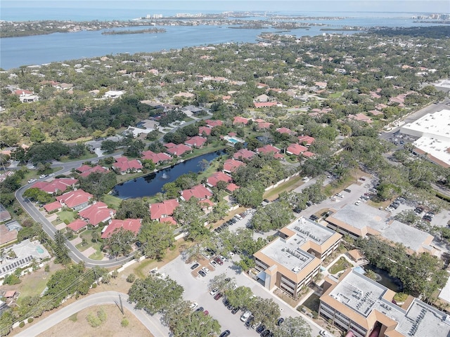 5039 Kestral Park Dr Unit 67, Sarasota, FL 34231 - aerial perspective of suburban area with a nearby body of water
