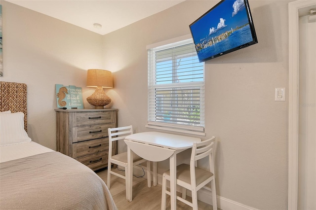 105 Casey Key Rd Unit 20, Nokomis, FL 34275 - bedroom featuring wood finished floors and baseboards