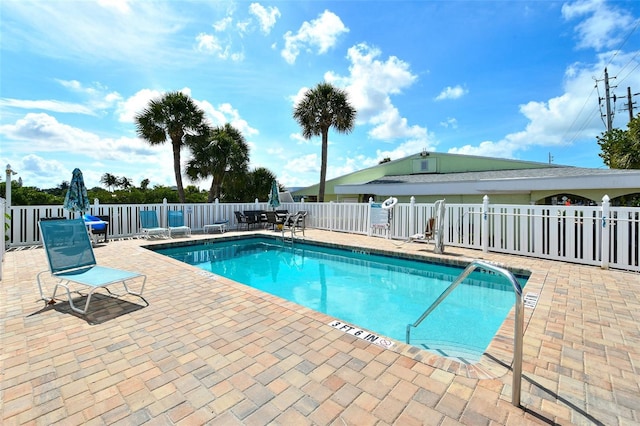 105 Casey Key Rd Unit 20, Nokomis, FL 34275 - community pool featuring a patio and fence