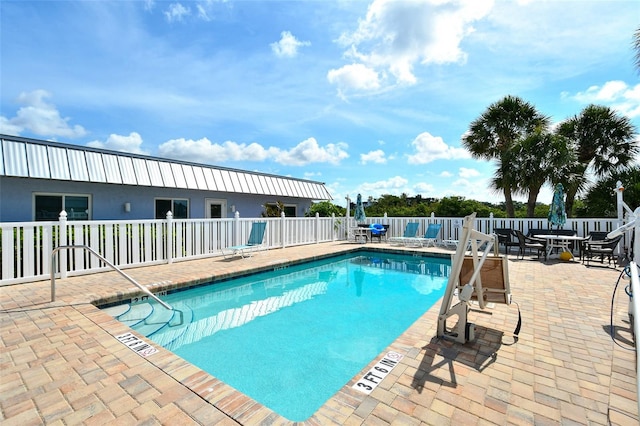 105 Casey Key Rd Unit 20, Nokomis, FL 34275 - community pool with a patio and fence
