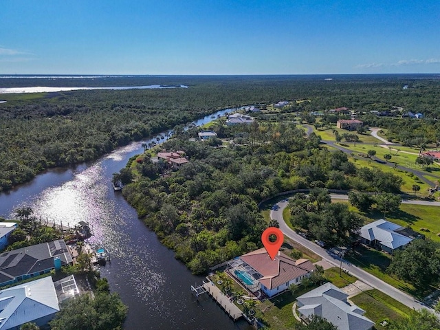 3620 Como St, Port Charlotte, FL 33948 - aerial view of property and surrounding area with a large body of water, a forest, and nearby suburban area