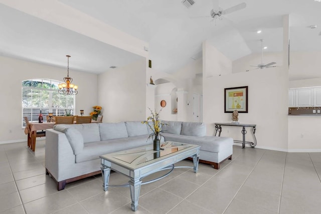 3620 Como St, Port Charlotte, FL 33948 - living area featuring ceiling fan, light tile patterned flooring, baseboards, a chandelier, and high vaulted ceiling