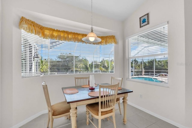 3620 Como St, Port Charlotte, FL 33948 - tiled dining space with baseboards