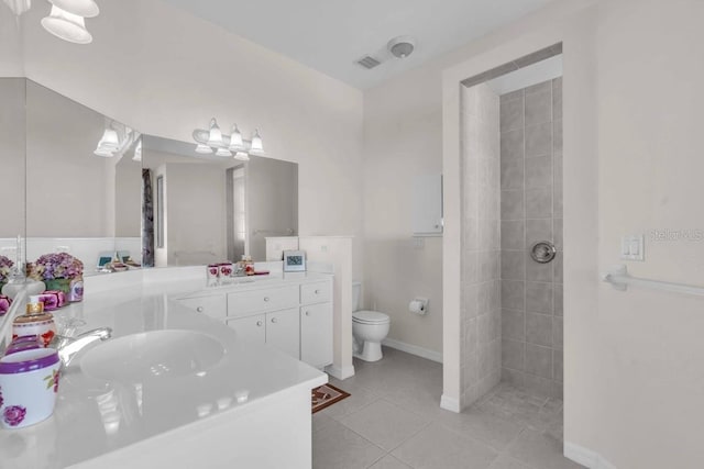 3620 Como St, Port Charlotte, FL 33948 - full bath featuring tile patterned floors, toilet, vanity, and a tile shower