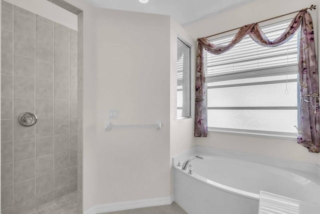 3620 Como St, Port Charlotte, FL 33948 - full bathroom featuring a tile shower and a garden tub