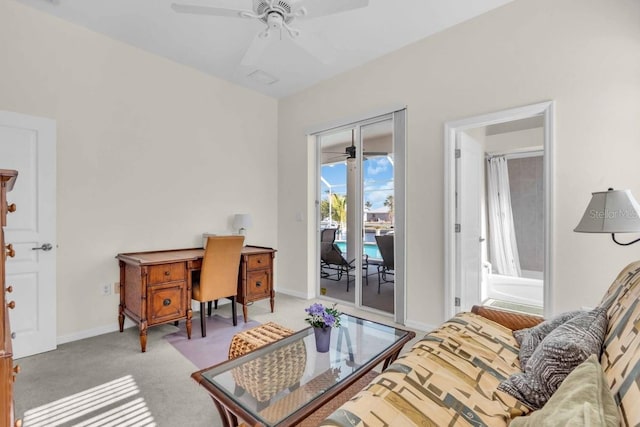 3620 Como St, Port Charlotte, FL 33948 - office area with a ceiling fan, baseboards, and light carpet