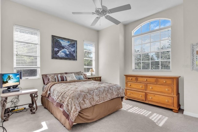3620 Como St, Port Charlotte, FL 33948 - bedroom featuring light carpet, baseboards, and a ceiling fan