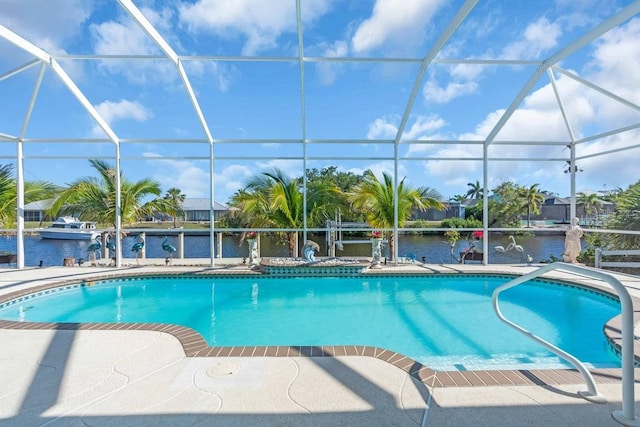 3620 Como St, Port Charlotte, FL 33948 - swimming pool with glass enclosure, a patio, and a water view