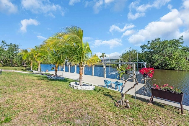 3620 Como St, Port Charlotte, FL 33948 - dock with a water view, a lawn, and boat lift