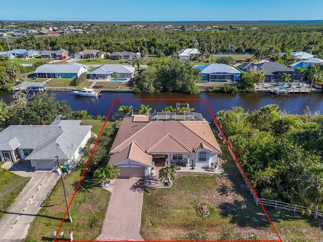 3620 Como St, Port Charlotte, FL 33948 - aerial view of residential area with a large body of water and property boundaries highlighted