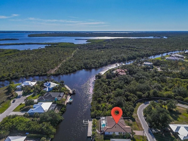 3620 Como St, Port Charlotte, FL 33948 - aerial view of property and surrounding area with a large body of water and a forest