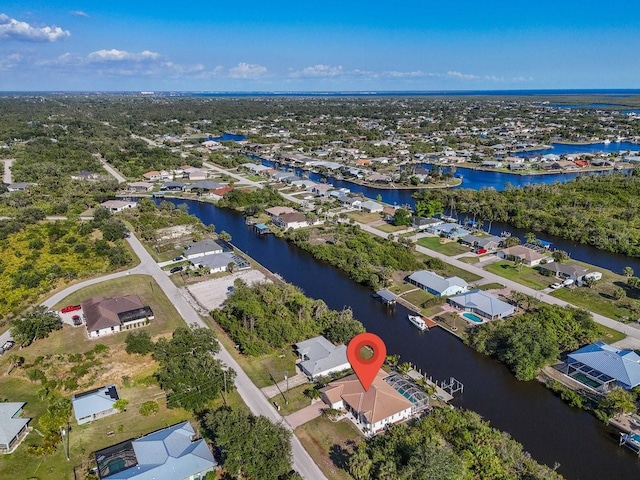 3620 Como St, Port Charlotte, FL 33948 - aerial view of residential area featuring a large body of water