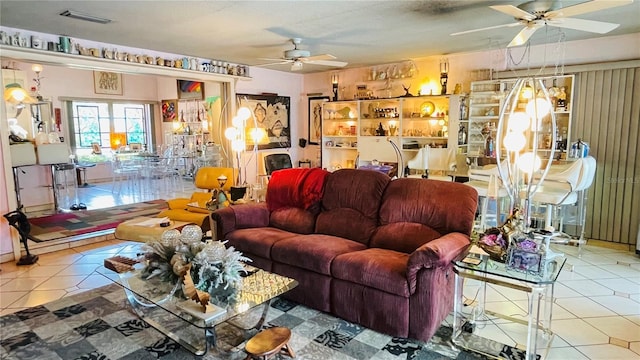409 Bryn Mawr Is, Bradenton, FL 34207 - living room with ceiling fan and tile patterned floors