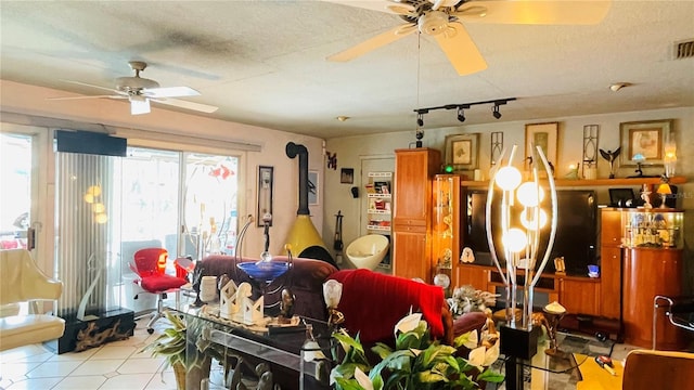 409 Bryn Mawr Is, Bradenton, FL 34207 - living area with a ceiling fan, track lighting, and tile patterned floors