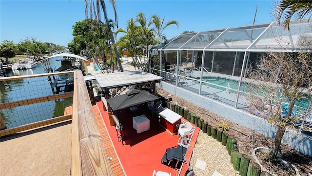 409 Bryn Mawr Is, Bradenton, FL 34207 - dock area with boat lift, an outdoor pool, a water view, and a lanai