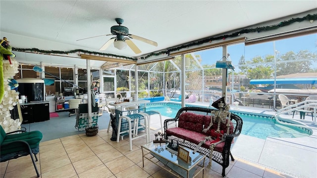 409 Bryn Mawr Is, Bradenton, FL 34207 - sunroom featuring a ceiling fan and a swimming pool