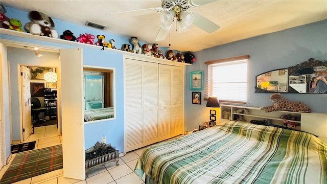 409 Bryn Mawr Is, Bradenton, FL 34207 - bedroom featuring tile patterned flooring, a closet, and a ceiling fan