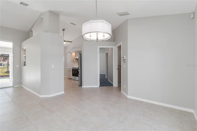 251 Broadmoor Ln, Rotonda West, FL 33947 - unfurnished room with light tile patterned floors, vaulted ceiling, and baseboards
