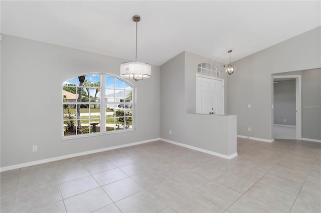 251 Broadmoor Ln, Rotonda West, FL 33947 - empty room featuring lofted ceiling, a chandelier, light tile patterned flooring, and baseboards