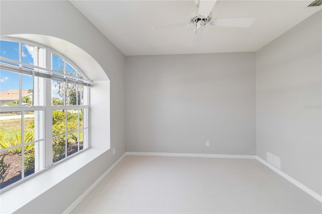 251 Broadmoor Ln, Rotonda West, FL 33947 - unfurnished room featuring light carpet, ceiling fan, and baseboards