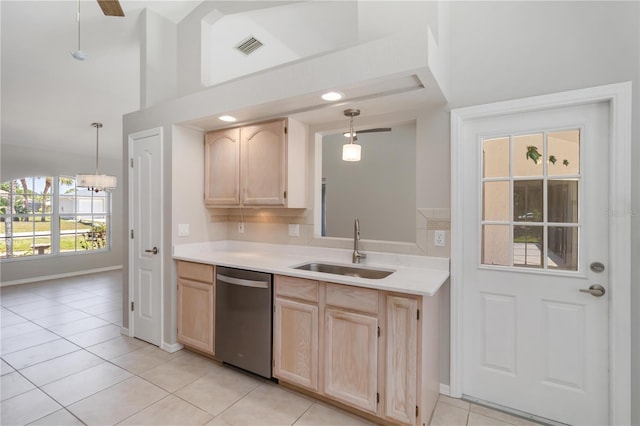 251 Broadmoor Ln, Rotonda West, FL 33947 - kitchen featuring stainless steel dishwasher, a sink, light brown cabinetry, and light tile patterned flooring