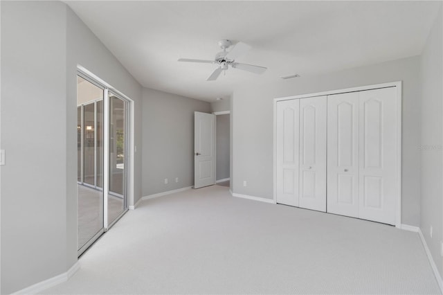 251 Broadmoor Ln, Rotonda West, FL 33947 - unfurnished bedroom featuring carpet flooring, baseboards, and ceiling fan