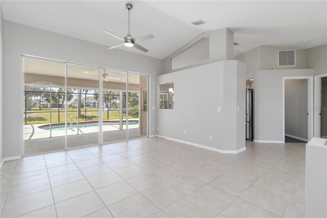 251 Broadmoor Ln, Rotonda West, FL 33947 - empty room featuring ceiling fan, light tile patterned floors, lofted ceiling, and baseboards